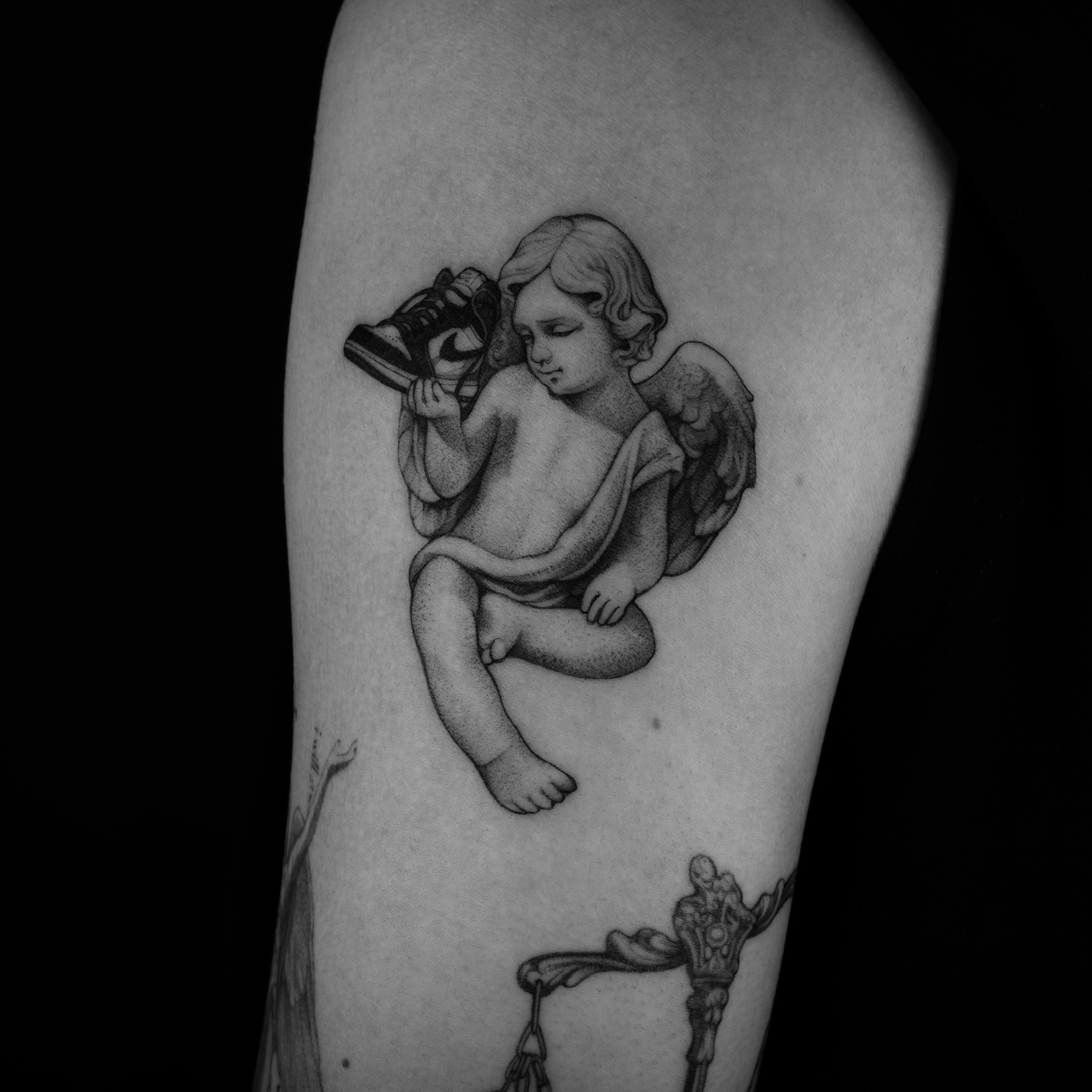 Cherub With Sneaker - Black and Grey Tattoo by San Francisco Tattoo Artist ZKINK